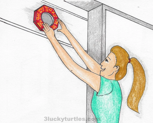 Image for post Illustration of a woman hanging a Bagua mirror on her front door.